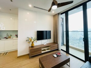 Deluxe Apartment, 2 Bedrooms, Lake View | Living area | 60-inch LCD TV with cable channels