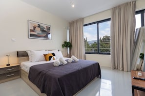 Double Room, City View | Iron/ironing board, free WiFi