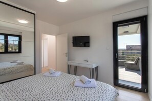 3 عدّة غرف نوم ومكواة/لوح كي وواي فاي مجانًا وملاءات أسرّة