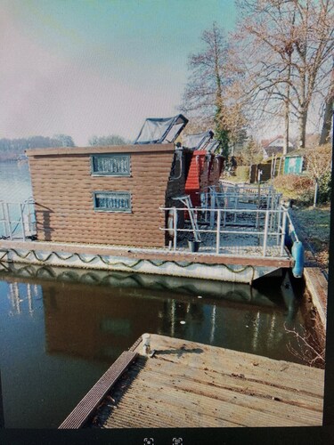 Small houseboat ideal for fishing.   Contact us +49 177 5927586