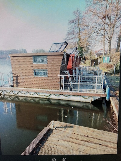 Small houseboat ideal for fishing. Contact us +49 177 5927586
