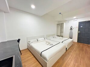 ห้องแฟมิลี่ | โต๊ะทำงาน, เตารีด/โต๊ะรีดผ้า, Wi-Fi ฟรี, ผ้าปูที่นอน
