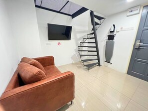 Familie maisonnette, meerdere bedden | Een bureau, een strijkplank/strijkijzer, gratis wifi