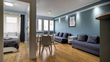 City Apartment | Living area | Flat-screen TV