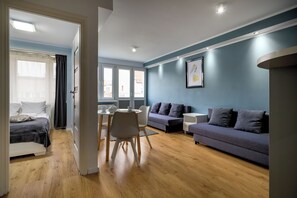 Apartamento urbano | Área de estar | TV de tela plana