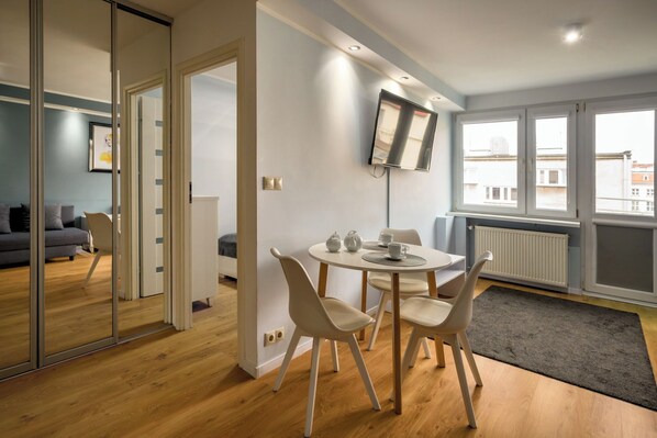 Apartamento urbano | Sala de estar | TV de tela plana