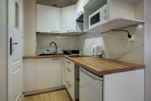 Suíte estúdio urbana | Cozinha americana privada | Cafeteira/chaleira, chaleira elétrica