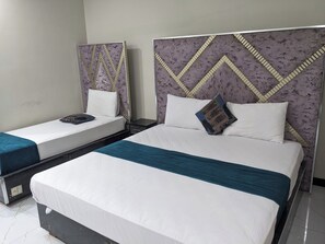 Quarto triplo luxo | Wi-Fi de cortesia, roupa de cama