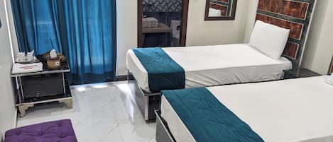 Chambre Triple Exécutive | Wi-Fi gratuit, draps fournis