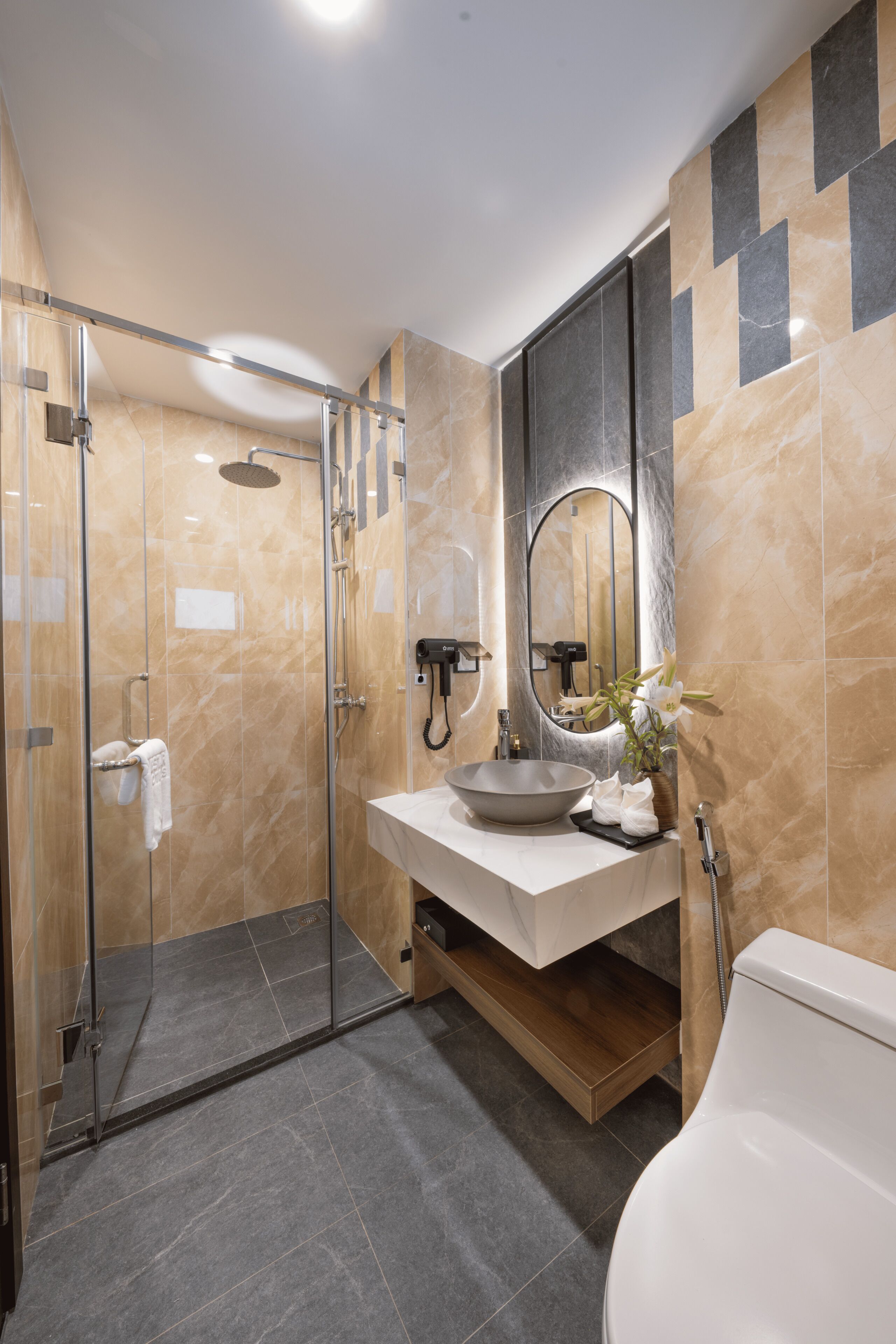 Shower, rainfall showerhead, designer toiletries, hair dryer