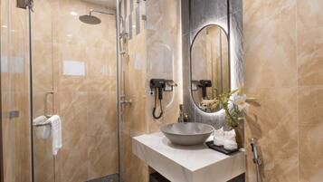 Shower, rainfall showerhead, designer toiletries, hair dryer