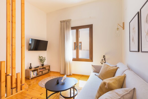 Maison Confort, vue ville | Coin séjour