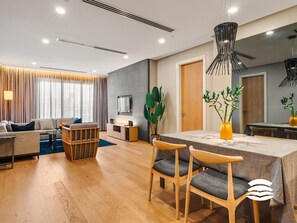 Family Apartment, City View | Living area | 49-inch Smart TV with digital channels, Netflix, streaming services - 188 Suites KLCC by Soulasia (Kuala Lumpur)