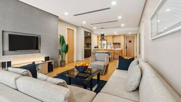 Apartment, 2 Bedrooms, Balcony, City View | Living area | 49-inch Smart TV with digital channels, Netflix, streaming services