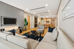 Family Apartment, City View | Living area | 49-inch Smart TV with digital channels, Netflix, streaming services - 188 Suites KLCC by Soulasia (Kuala Lumpur)