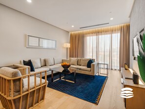 Family Apartment, City View | Living area | 49-inch Smart TV with digital channels, Netflix, streaming services - 188 Suites KLCC by Soulasia (Kuala Lumpur)
