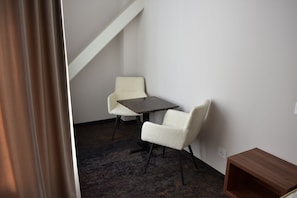 Deluxe Double Room | Living area | Smart TV