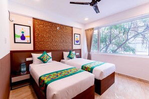 Standard Double Room | Iron/ironing board - Treebo Emirates Suites Indiranagar (Bangalore)
