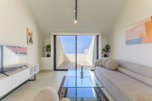 402 (A) - Mountain view 1 Bedroom & Balcony | Living room | 43-inch Smart TV with cable channels, streaming services - Brummana Heights Apartments (Broumana)