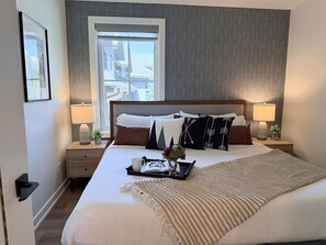 2 bedrooms, desk, iron/ironing board, travel crib