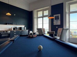 Game room - Welcome to Seas The View, our beautiful one bedroom flat brimming with Victorian character and offering a unique experience and parking available on street locally. (Ramsgate)