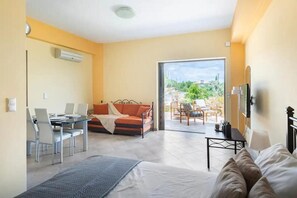 Shared Dormitory, Multiple Bedrooms, Terrace, Garden View | Living room - Room-charming Peroulia Bay View Studio w (Pylos-Nestoras)