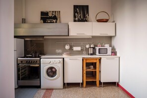 Departamento, balcón, vista a la ciudad | Cocina privada