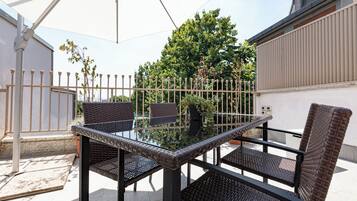 Deluxe Double Room, Courtyard View | Terrace/patio