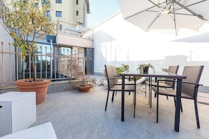 Deluxe Double Room, Courtyard View | Terrace/patio