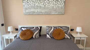 1 habitación, tabla de planchar con plancha, wifi gratis y ropa de cama