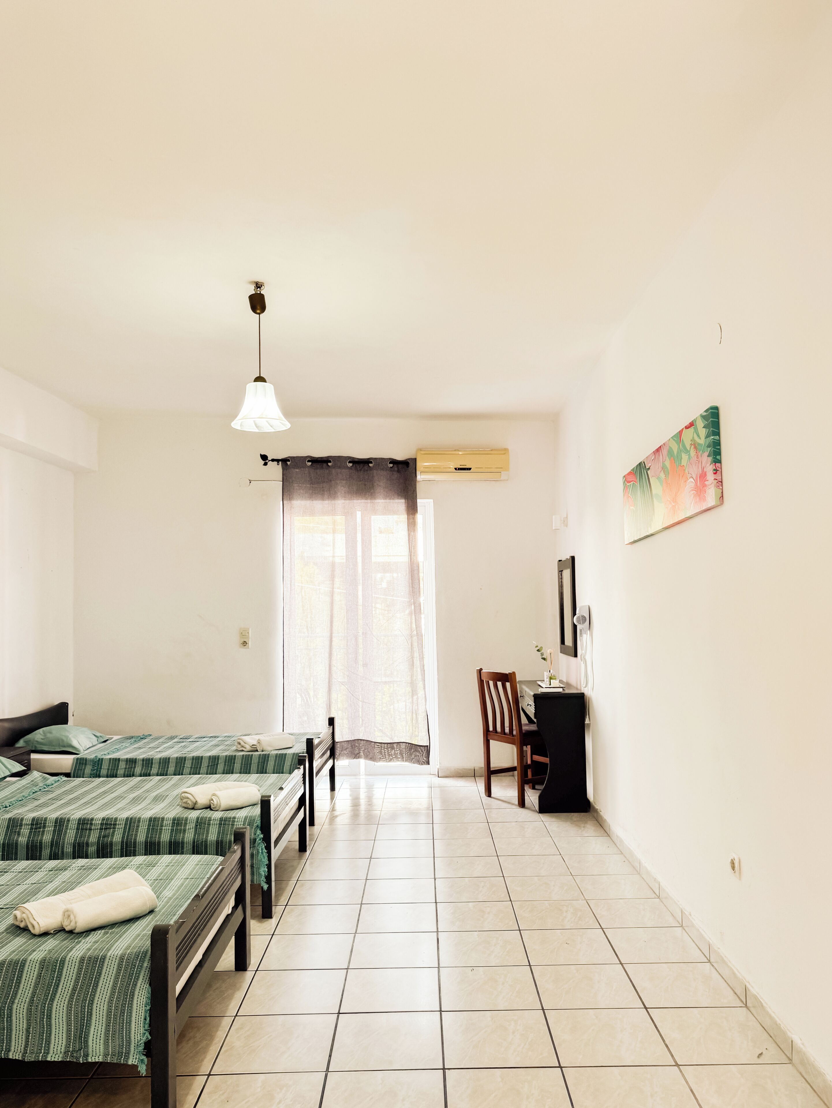 Basic Triple Room, Non Smoking, Pool View | In-room safe, free WiFi
