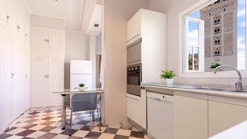 Appartement (2 Bedrooms) | Privékeuken | Een koelkast, een magnetron, een oven, een kookplaat
