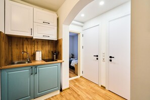 Fridge, microwave, stovetop, coffee/tea maker