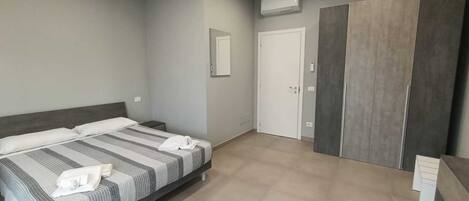 2 habitaciones y ropa de cama