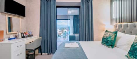 Suite Deluxe, vue sur la montagne | Draps en coton égyptien, literie de qualité, couette en duvet