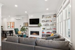 Smart TV, fireplace, books