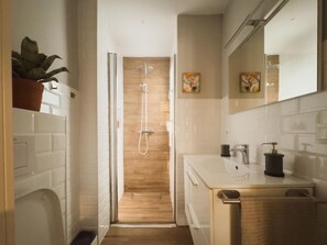 Shower, hair dryer, towels, soap