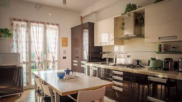 Apartment, Patio | Private kitchen | Fridge, oven, stovetop, dishwasher