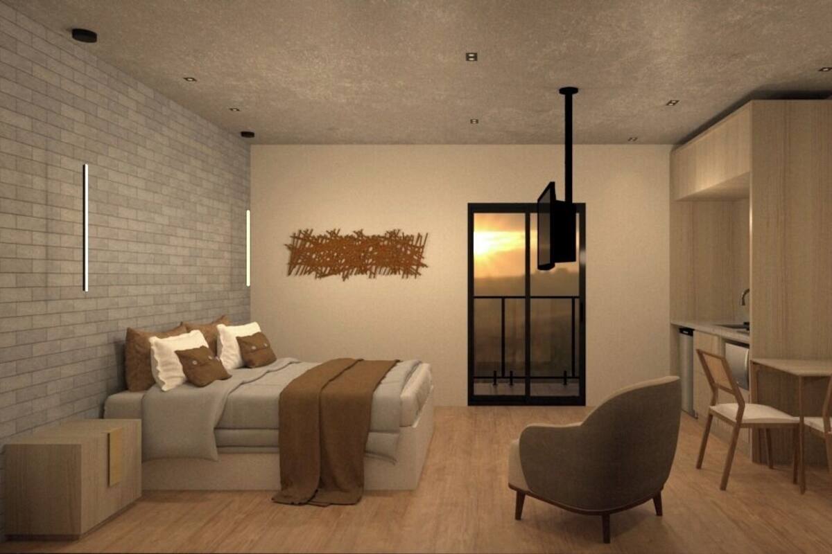 Un dormitorio moderno con una cama, un escritorio y una silla.