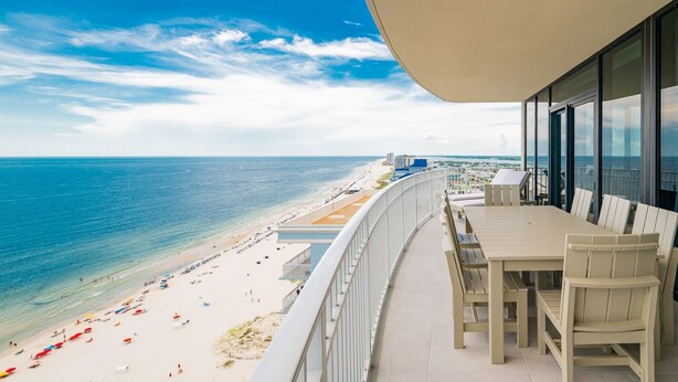A balcony with a view of a beach and ocean. - Phoenix Gulf Shores Ii 2201 4 Bedroom Condo (Gulf Shores)