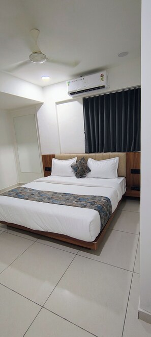 Chambre Double Deluxe, vue ville | Coin séjour