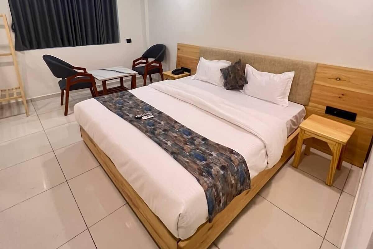 Quarto casal superior, vista para a cidade | 1 quarto, ferros/tábuas de passar roupa