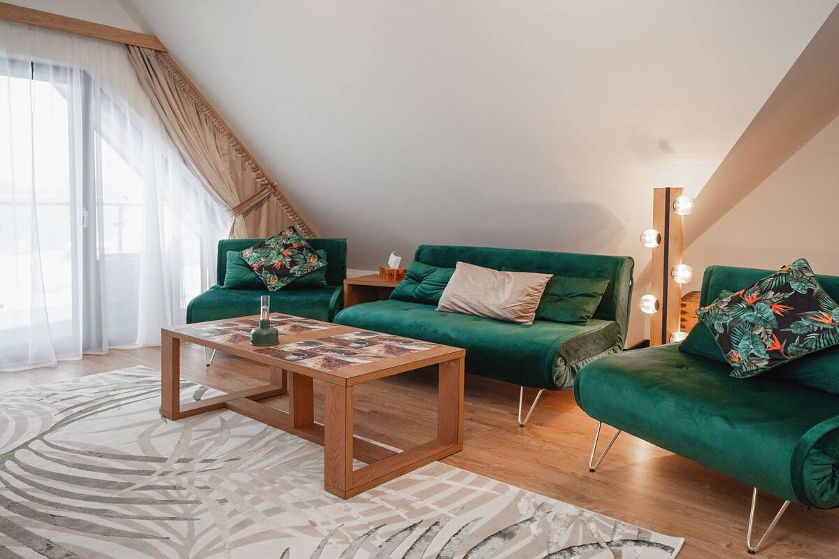 Apartment (P16) | Living area | Flat-screen TV
