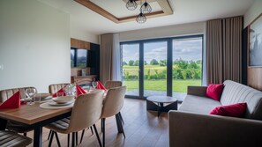 Apartamento (P4) | Zona de estar | Una televisión de pantalla plana