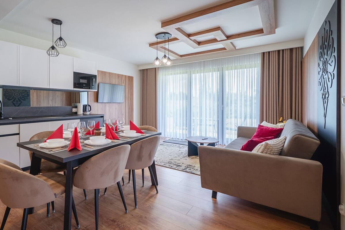 Apartment (P5) | Living area | Flat-screen TV