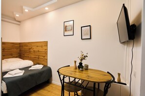 1 dormitorio, tabla de planchar con plancha, cuna de viaje y wifi