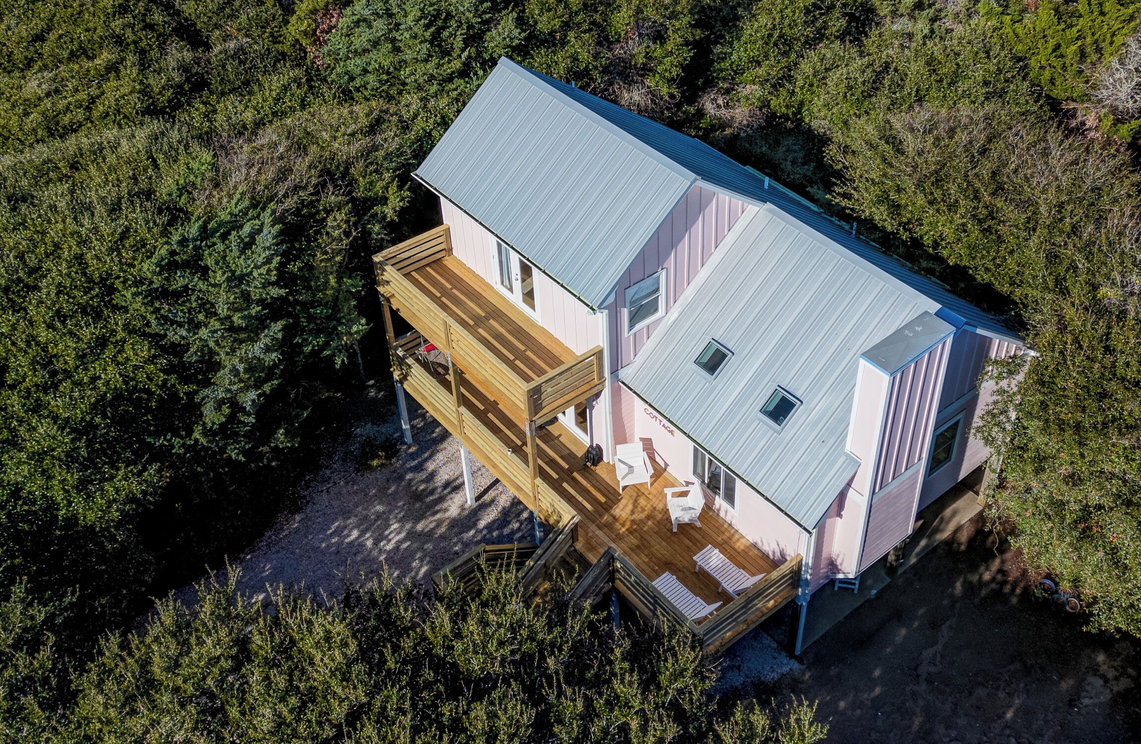 Pink house. New Polywood furniture. Railings have been painted white