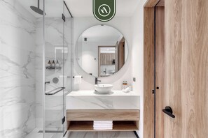 Shower, hair dryer, towels