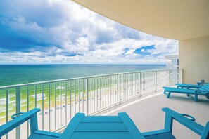 A balcony with a view of the beach and ocean. - New Gulf front Condo! Family Fun in Gulf Shores – PGS2 1903 (Gulf Shores)