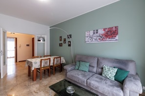 Superior Apartment, Balcony | Living area | 50-inch Smart TV with digital channels - notaMi - Feels Like Home (Milan)